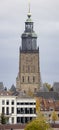 Towering tower over old Dutch city Royalty Free Stock Photo