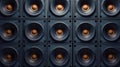 A towering wall of professional subwoofers, arranged in a grid pattern, front view Royalty Free Stock Photo