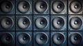A towering wall of professional subwoofers, arranged in a grid pattern Royalty Free Stock Photo