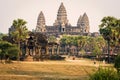 Towers of Angkor Wat temple with rays of sunset evening