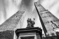 Towers of Bologna and statue of St. Petronius Royalty Free Stock Photo