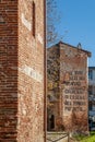 The towers of the city walls of Cascina, Pisa, Italy, with the exhortation to look higher Royalty Free Stock Photo