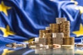 Towers with euro coins and flag of European Union in the background