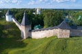 Towers of the Holy Dormition Pskov-Caves Monastery on a sunny July day. Pechory, Russia Royalty Free Stock Photo