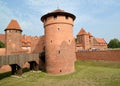 Towers of the Knight`s Castle of the Teutonic Order on a summer day. Marlbork, Poland