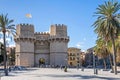 Towers of Serranos or Serranos Gate with visitors entering the old city of Valencia, Spain