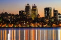 Towers, skyscrapers and buildings in Dnepr city at night, lights reflected on the river Dnieper, Ukraine. Royalty Free Stock Photo