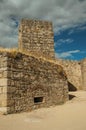 Towers and stone walls facade at the Castle of Trujillo Royalty Free Stock Photo