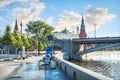Towers and temples of the Kremlin in Moscow and bicycles on the embankment of the Moskva River Royalty Free Stock Photo
