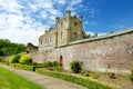 The towers and turrets of Ducketts Grove, a ruined 19th-century great house and former estate in Ireland.