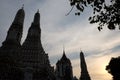 Towers of Wat Arun Temple against the evening sky