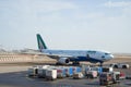 Towing Aircraft Airbus A330 - MSN 1123 (EI-EJG) of Alitalia after landing at the airport in Abu D