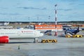 Towing the airplane to the taxiway using an aircraft tractor at Sheremetyevo airport, Moscow