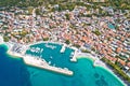 Town of Baska Voda beach and waterfront aerial view