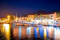 Town of Bol on Brac island harbor at blue hour view Royalty Free Stock Photo