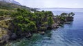 Beautiful coastline on the Riviera Makarska on Adriatic sea in Croatia, tourist resorts and beach, overhead view