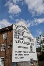 Old painted sign on Bridgnorth building