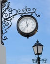 The town clock and street lamp Royalty Free Stock Photo