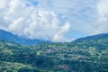 The town of Combloux in the Mont Blanc Massif in Europe, France, the Alps, towards Chamonix, in summer, on a cloudy day Royalty Free Stock Photo