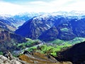 The town of Glarus and the settlement of Ennenda in the alpine valley of the Linth River Royalty Free Stock Photo