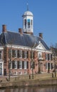 Town hall at a canal in historical Dokkum Royalty Free Stock Photo