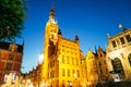 Town Hall and Neptune`s Fountain at Dlugi Targ Long Market street at night in Gdansk, Poland Royalty Free Stock Photo