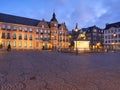 Town hall in the old town of Dusseldorf in Germany. Beautifully illuminated Central Square with the Johann Wilhelm II monument.