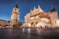 Town Hall Tower and Cloth Hall at Main Market Square at night - Krakow, Poland Royalty Free Stock Photo