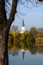 Town Hall tower in Litovel in the mirror of the pond