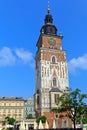 Town hall tower on main market square on blue sky background, Krakow , Poland. Royalty Free Stock Photo