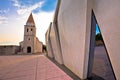 Town of Krk historic square church and modern architecture view