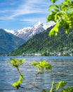 Town and lake of Zell am See in front of the impressive snow-capped Kitzsteinhorn, Zell am See, Pinzgau, Salzburger Land, Austria Royalty Free Stock Photo