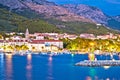 Town of Makarska waterfront and Biokovo mountain evening view