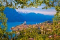 Town of Malcesine on Lago di Garda skyline viewthrough leaves fr Royalty Free Stock Photo