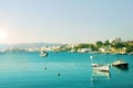 Town By The Mediterranean Sea In Turquoise Lagoon, Fishing Boats In Turquoise Water On The Clear Sky Background, Summer Landscape