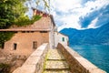 Town of Nesso historic stone bridge and scenic lakefront view Royalty Free Stock Photo