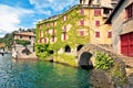 Town of Nesso historic stone bridge and waterfront on Como Lake Royalty Free Stock Photo