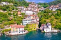 Town of Nesso on steep cliffs and creek waterfall on Como Lake aerial waterfront view Royalty Free Stock Photo