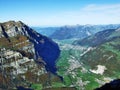 The town of Nestal and the settlement of Riedern in the alpine valley of the Linth River Royalty Free Stock Photo