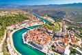 Town of Obrovac and Zrmanja river panoramic aerial view