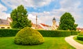 Town park greenery and church of Saint Lawrence in Dacice, Czech Republic