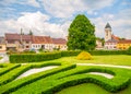 Town park greenery and church of Saint Lawrence in Dacice, Czech Republic