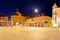 Town of Ptuj historic main square panoramic evening view