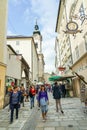 Tourists visiting Salzburg historic quarter