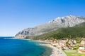 The town on the rocky coast in the middle of green countryside , Europe, Greece, Aetolia Acarnania, Kato Vasiliki towards Patras, Royalty Free Stock Photo