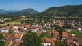 Town of Saint-Jean-Pied-de-Port under hills and blue sky in the Basque Country of France