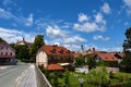 Town of Skofja Loka with a church tower and a castle above Royalty Free Stock Photo