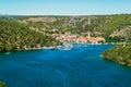 Town of Skradin on Krka river in Dalmatia, Croatia viewed from distance Royalty Free Stock Photo