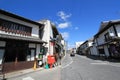 Town, sky, road, neighbourhood, street, transport, residential, area, house, city, lane, downtown, building, car, facade, mountain