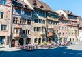 Town square of Stain Am Rhein with typical architecture and fresco painting on a beautiful and busy spring day